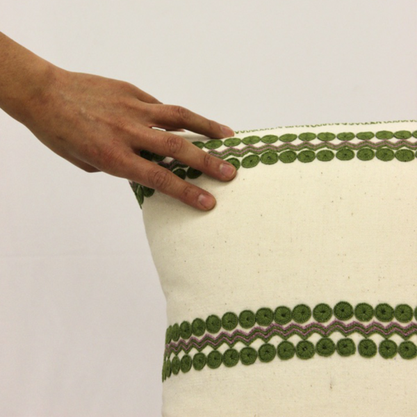 Mexican Telar Cushion with green details.