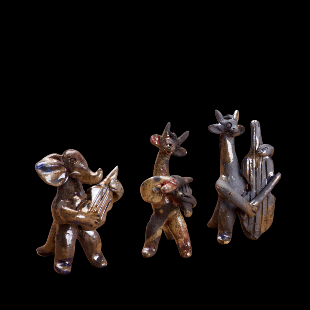 
                  
                    Clay Animals 
                  
                